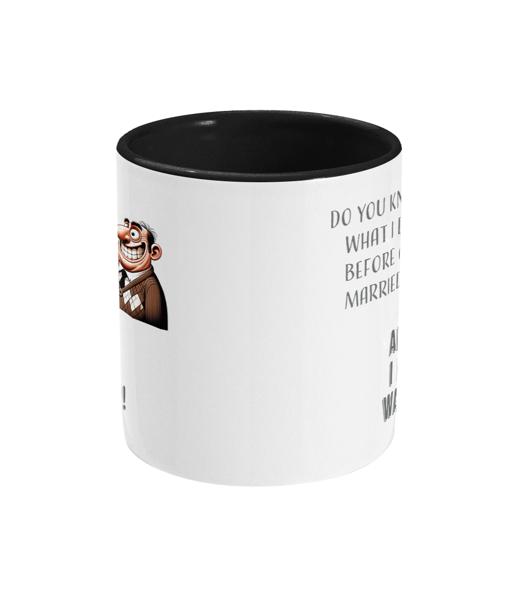 A white ceramic coffee mug with a black interior and handle. The mug displays the cheeky text, “Do you know what I did before I got married? Anything I f*cking wanted to!” paired with a cartoon illustration of a cheerful older man holding a beer mug. The text uses playful fonts, emphasizing the humorous tone.