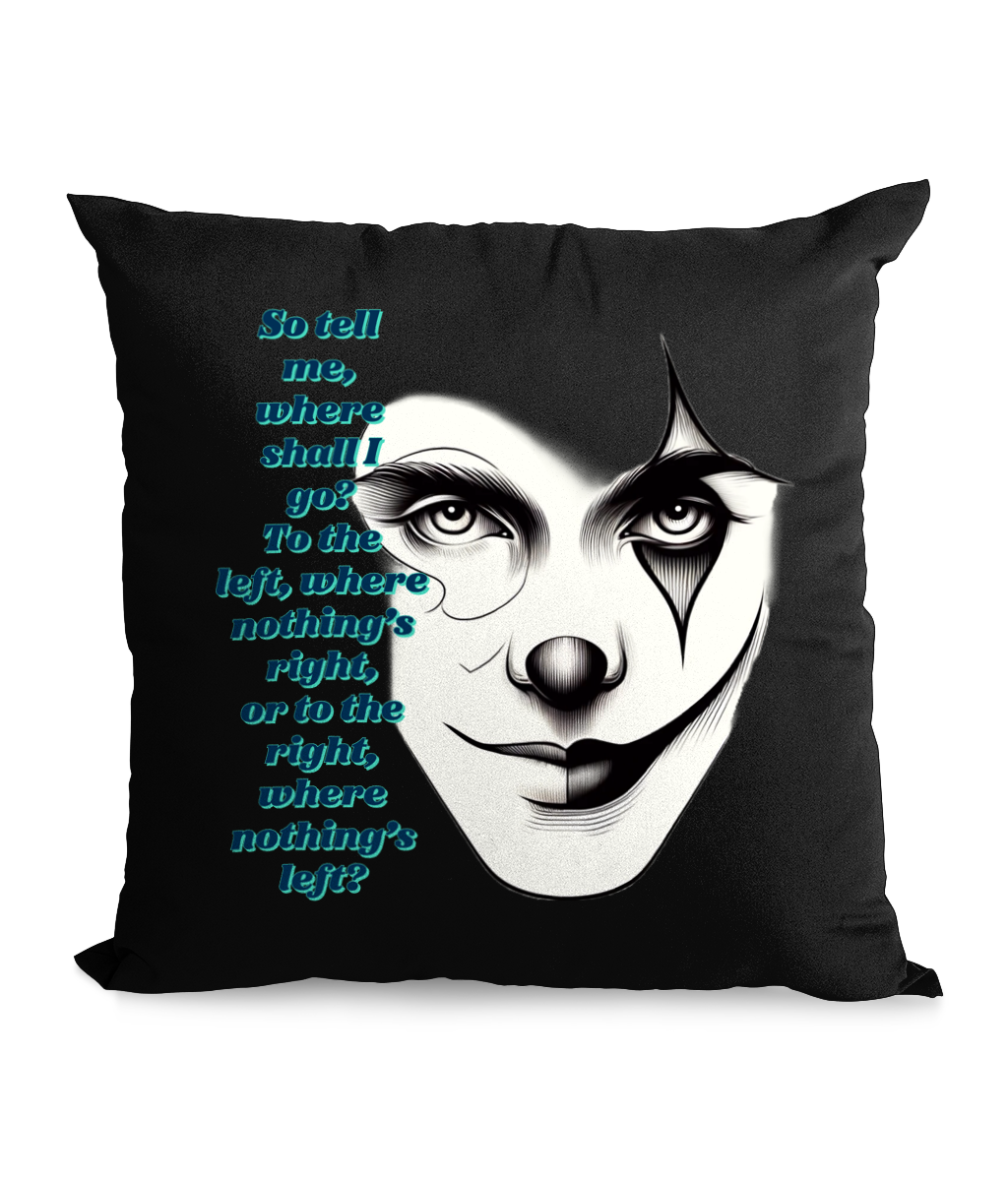 Black cushion with a monochrome clown face design and blue poetic text: ‘Where shall I go? To the left, where nothing’s right, or to the right, where nothing’s left.’”