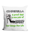  

“Black canvas cushion with high heel illustration and the text ‘Cinderella is proof a new pair of shoes can change your life’ in bold green and white.”