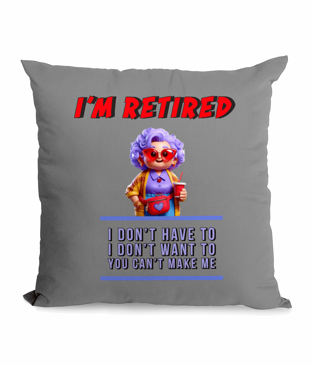 Black canvas cushion with text ‘I’m Retired – I don’t have to, I don’t want to, you can’t make me’ and a colorful granny holding a drink.”