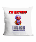 Black canvas cushion with text ‘I’m Retired – I don’t have to, I don’t want to, you can’t make me’ and a colorful granny holding a drink.”