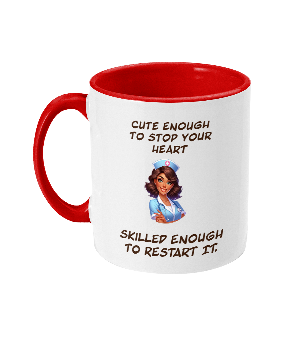 A white ceramic coffee mug with a red interior and handle, featuring the text “Cute enough to stop your heart, skilled enough to restart it.” The design includes a colorful cartoon illustration of a confident nurse in a blue uniform, adding a playful and empowering tone to the mug. The text is styled in bold, casual fonts.