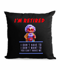 Black canvas cushion with text ‘I’m Retired – I don’t have to, I don’t want to, you can’t make me’ and a colorful granny holding a drink.”