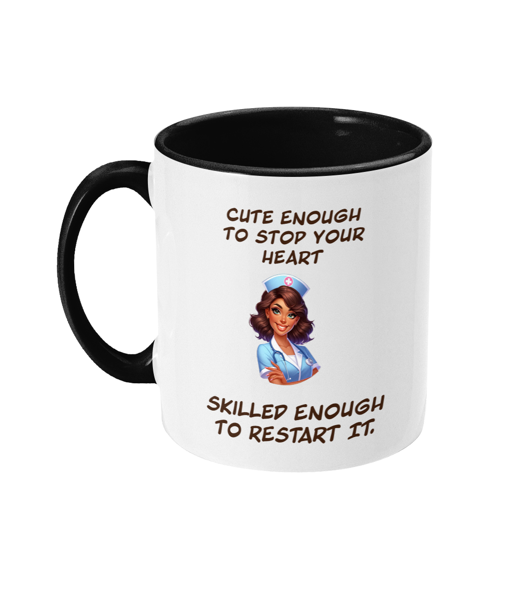 A white ceramic coffee mug with a black interior and handle, featuring the text “Cute enough to stop your heart, skilled enough to restart it.” The design includes a colorful cartoon illustration of a confident nurse in a blue uniform, adding a playful and empowering tone to the mug. The text is styled in bold, casual fonts.